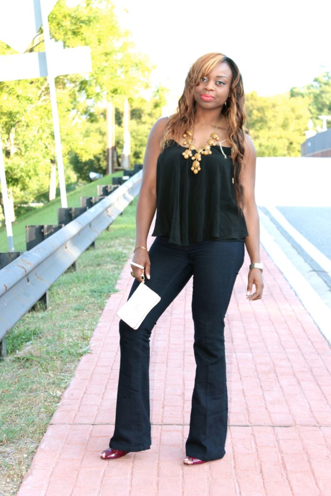 Black cami tank + flared jeans