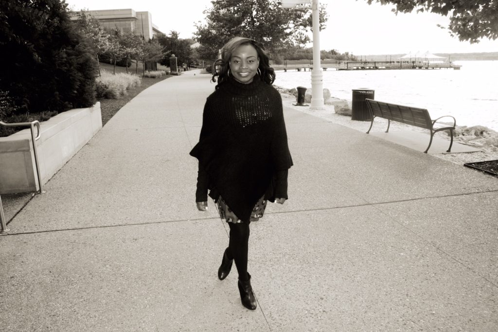 Red print dress and black poncho, black & white