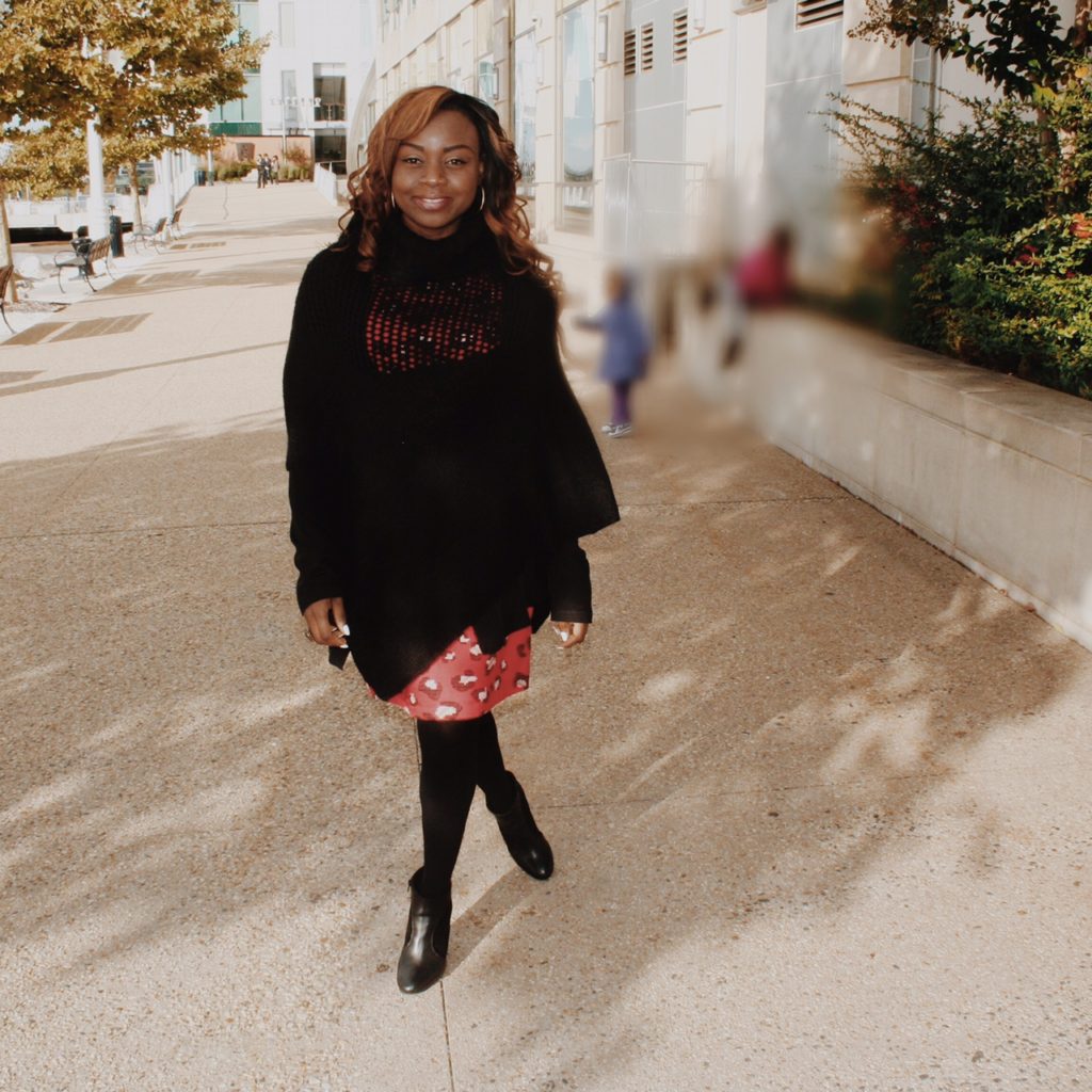 Red print dress and black poncho 