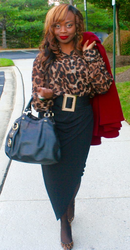 Animal print top, black wrap skirt, Gucci bag