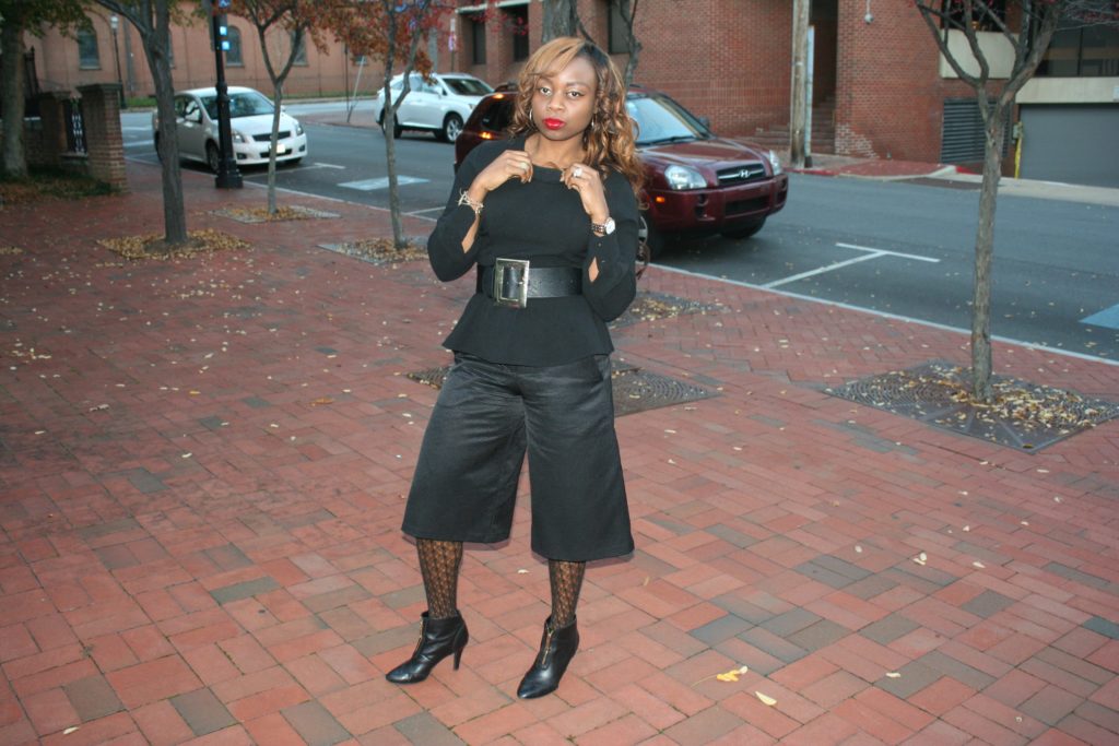 Black culottes with black peplum top, black patterned tights and black ankle boots2