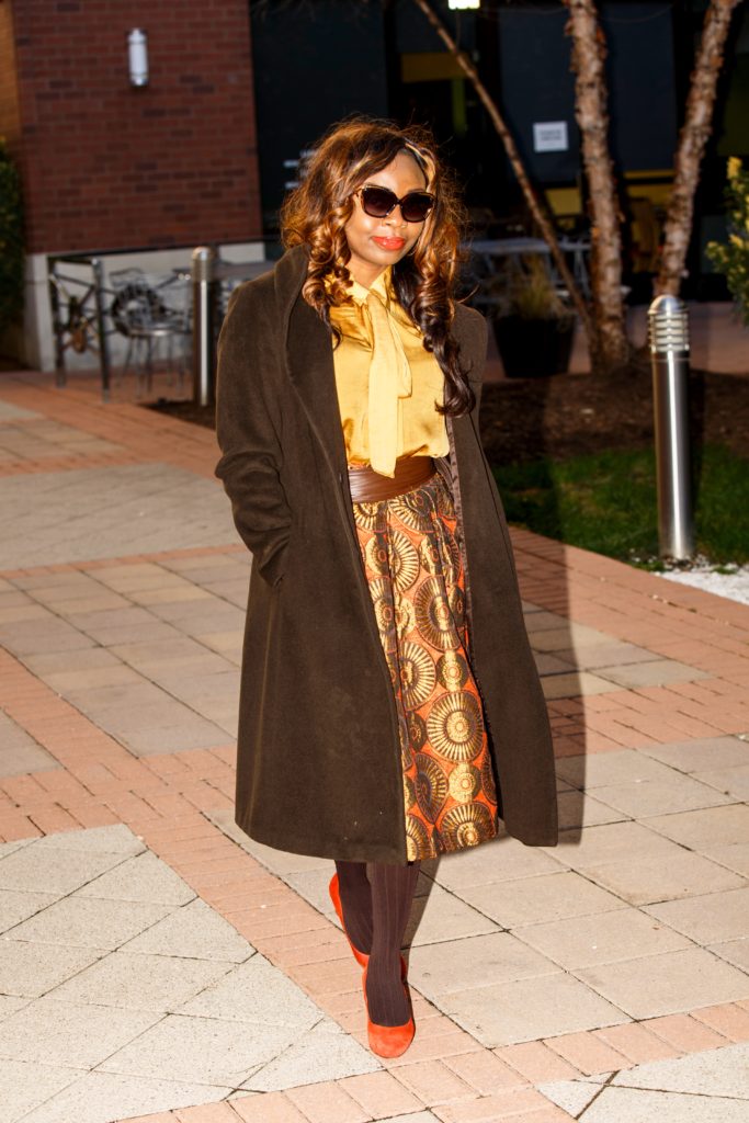 2lookbooks walking-browncoat-PrabalGurungglasses-goldandorangeskirt