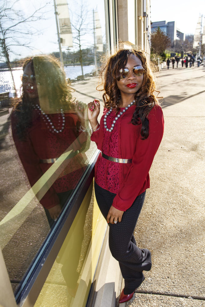 Red top with silver belt and red shoes-rayban shades