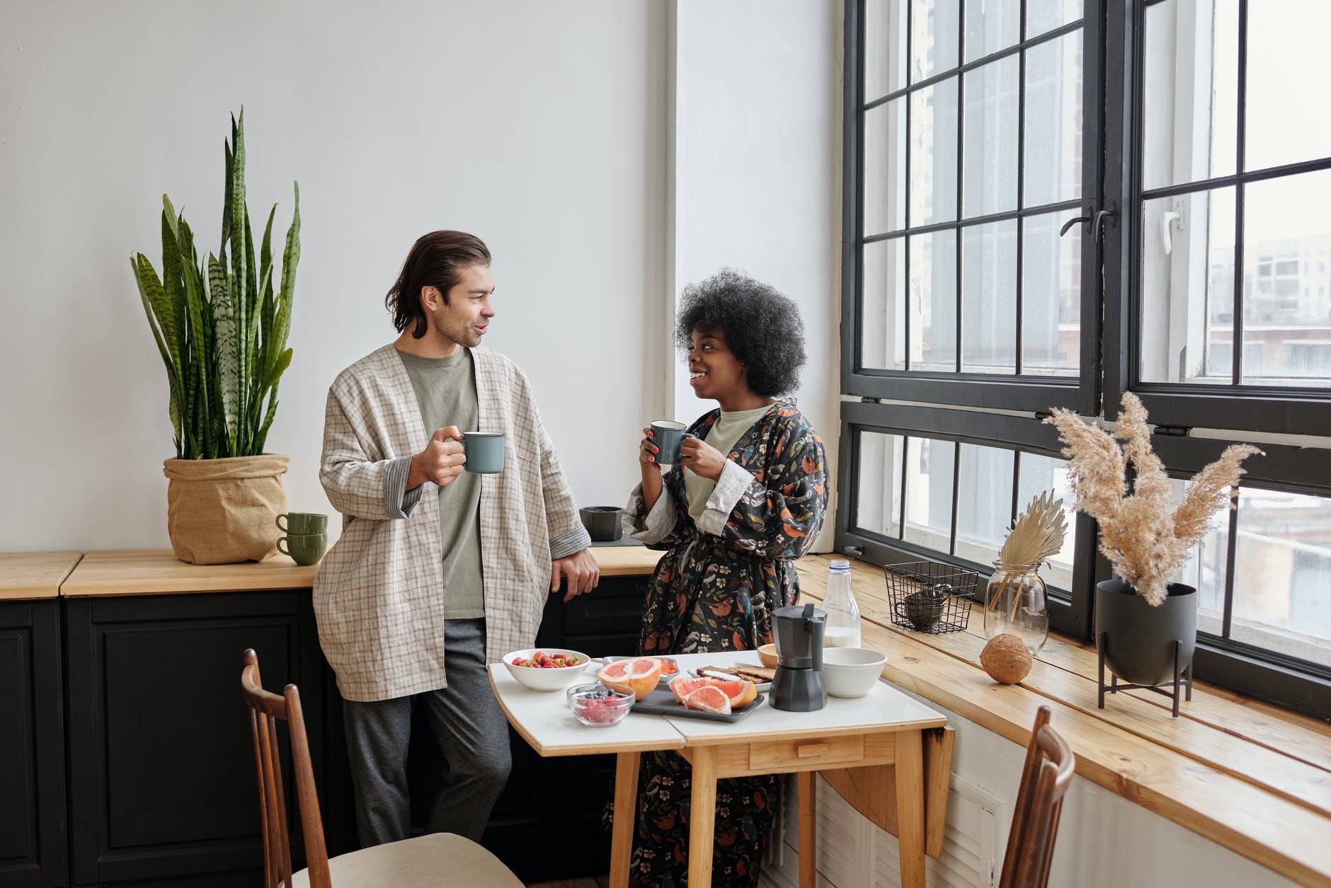 happy couple having breakfast